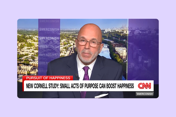 Still from CNN interview with Dr. Burrow about The Contribution Project's research